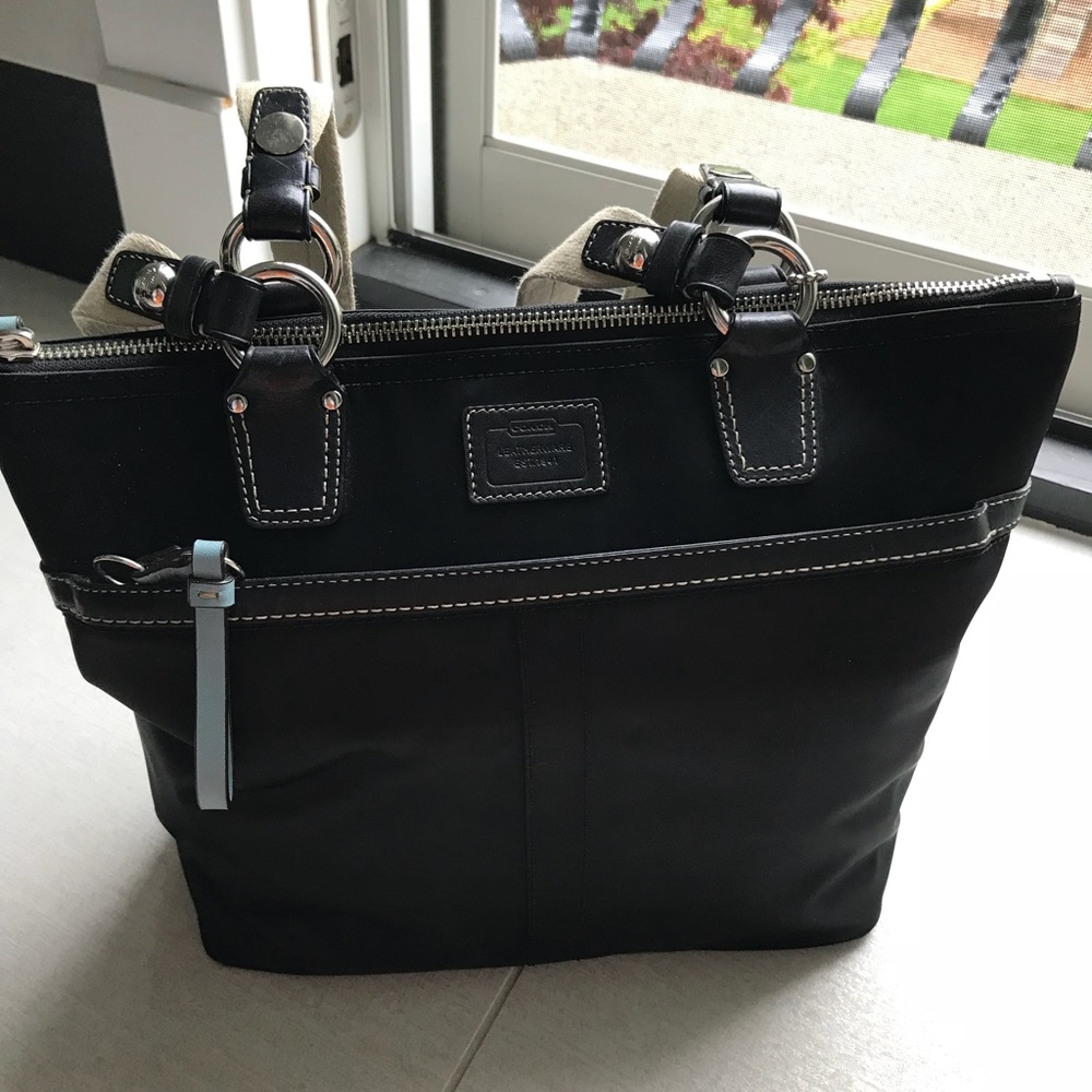 Black coach bag with baby blue detailing